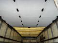 Interior view of a 2006 Hino 268 box truck showing the ceiling structure with overhead lights and metal framework