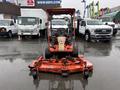 A 2012 Kubota F3680 lawn mower with a front-mounted cutting deck and a red cab designed for commercial landscaping and maintenance