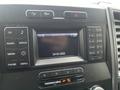 Dashboard of a 2016 Ford F-150 featuring a digital display and various control buttons for radio media and air conditioning