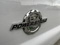 A chrome badge displaying "6.7 POWER STROKE" on the side of a 2016 Ford F-550 truck