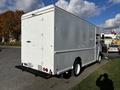 A white 2017 Freightliner M Line box truck seen from the rear with a smooth exterior and no visible branding or markings