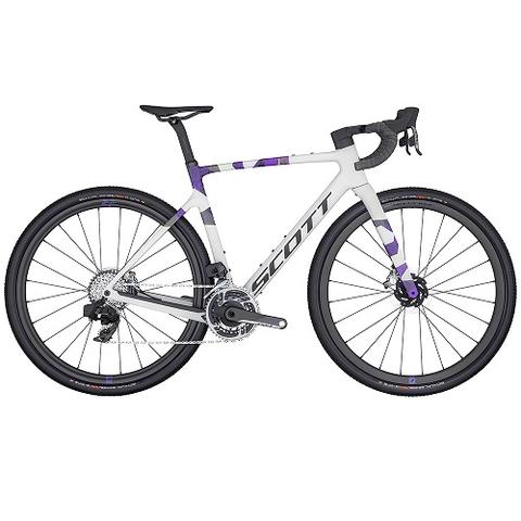 2024 Scott Addict Gravel RC road bike featuring a white frame with purple accents disc brakes and wide tires designed for gravel and road cycling