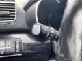 Close-up of a 2015 Kia Sorento dashboard control stick used for managing headlights and other functions