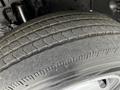 Close-up of a tire from a 2018 Hino 195 showing tread pattern and sidewall detailing