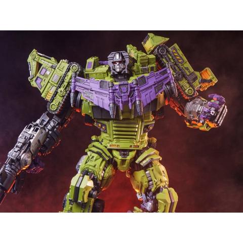 Transformers Museum Scale Devastator Statue featuring a large robot with green and purple colors multiple detailed components and weapons creating a formidable appearance