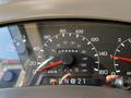 The dashboard of a 2000 Ford Motorhome displaying speedometer and odometer readings with various gauges