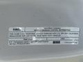 A label on a 2023 Ford F-550 detailing vehicle emission control information and specifications related to diesel fuel and compliance with regulations