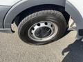 A close-up view of a 2016 Ford Transit tire showcasing its steel wheel and all-weather Hakkapeliitta tire tread