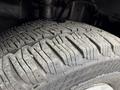 Close-up of a worn tire tread on a 2017 Ford Transit showcasing the grooves and patterns of the tire surface