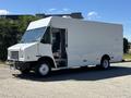 A white 2019 Freightliner MT45 delivery truck with a boxy design and large front windshield