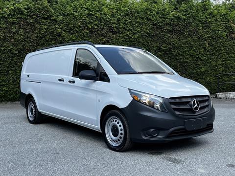 A 2020 Mercedes-Benz Metris van in white with a black front bumper and wheels parked on a flat surface