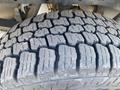 Close-up of a tread pattern on a tire from a 2017 Ford F-150 showing distinct grooves and wear on the rubber surface