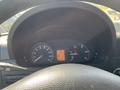 Dashboard of a 2010 Mercedes-Benz Sprinter displaying speedometer and fuel gauge with a digital display showing information