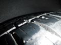 Close-up of a tire tread on a 1974 Dodge Challenger showing grooves and patterns indicating wear and grip