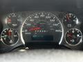 Dashboard of a 2017 Chevrolet Express displaying speedometer fuel gauge and odometer with 409132 kilometers shown