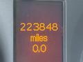 A digital odometer display showing 223848 miles and 0.0 miles on a 2007 Dodge Sprinter