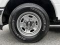 Close-up of a 2017 Ford F-250 wheel featuring a silver alloy rim and a Firestone Transforce HT tire