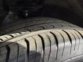 Close-up of the tread on a tire from a 2020 Ford Escape showing detailed patterns and grooves