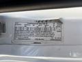 2020 Chevrolet Express vehicle specification label displaying details such as tire sizes and vehicle identification number