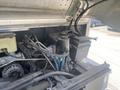 Engine compartment of a 2007 Morgan Olson Workhorse W42 showcasing various components including hoses a reservoir and a power steering pump