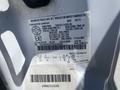 A 2015 Ford F-450 SD vehicle identification label showing specifications and weights for the truck