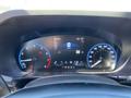 Dashboard of a 2023 Ford Bronco Sport displaying speedometer and fuel gauge with a digital screen showing speed and other information