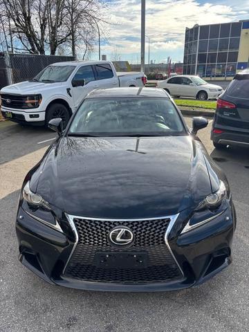 A black 2014 Lexus IS 350 with a sleek design featuring a prominent front grille and angular headlights viewed from the front