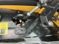 Control panel and lever mechanism of a 2024 AGT Industrial Yellow H13R Mini Excavator