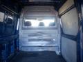 Interior view of a 2017 Mercedes-Benz Sprinter van showing the cargo area with a bare floor and rear windows