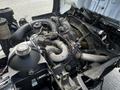 The image shows the engine compartment of a 2009 Ford LCF 550 featuring various engine components including the turbocharger belts and hoses