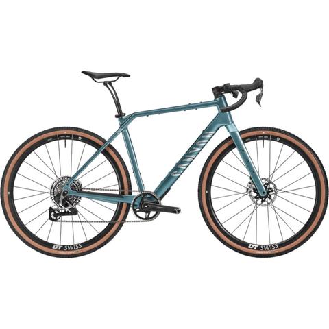 A 2026 Canyon Grizl CF 9 ECLIPS Carbon Adventure Gravel Road Bike featuring a sleek design with wide tires and a modern matte finish in teal color