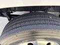 A close-up view of a tire on a 2020 Chevrolet Silverado showing detailed tread pattern and the sidewall of the tire