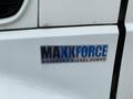 A close-up of a badge on a truck showing "MAXXFORCE" and "ADVANCED DIESEL POWER" indicating the engine type