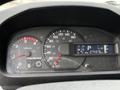 Dashboard of a 2014 Hino 195 featuring speedometer fuel gauge and hybrid indicator with digital display showing odometer reading of 274376