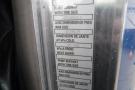 A label on a 2015 Kenworth T660 indicating tire size and pressure specifications including measurements in kPa and rim dimensions