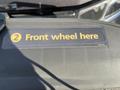 A label indicating the location for the front wheel on a 2018 Chevrolet Express