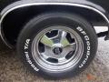 Close-up of a shiny silver wheel and tire on a 1974 Dodge Challenger featuring BFGoodrich lettering and a polished rim