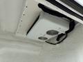 A ceiling-mounted air conditioning unit inside a 2017 Ford Transit van