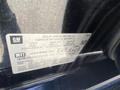 A detailed vehicle information label from a 2014 GMC Sierra 1500 showing specifications like GVWR and vehicle identification number