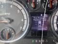 Dashboard display of a 2012 RAM 2500 showing RPM gauge tire pressure indicator and odometer reading