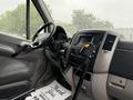 Interior of a 2016 Mercedes-Benz Sprinter showing the driver's seat steering wheel dashboard and center console