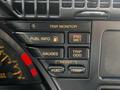 Dashboard buttons of a 1992 Chevrolet Corvette featuring controls for trip monitor fuel info engine metrics gauges and reset