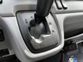 The gear shift of a 2015 Mitsubishi Fuso FE with labeled positions for park reverse neutral and drive