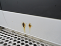 Rust spots on the side panel of a 2009 Dodge Sprinter Van