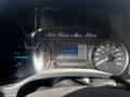 The dashboard of a 2018 Ford F-550 showing various gauges including speedometer fuel gauge and trip computer display