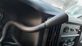 Close-up of the gear shift lever inside a 2005 Chevrolet Express van