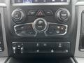 Control panel of a 2022 RAM 1500 Classic featuring climate controls media options and various vehicle functions