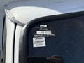 2023 Ford E-450 with a black and white approval sticker on the windshield indicating the expiry date and approval information