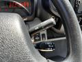 Steering wheel of a 2020 Hino 155 showing controls for cruise control settings and other functions