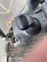 Close-up of the joystick and controls inside a 2012 John Deere 310SJ backhoe loader